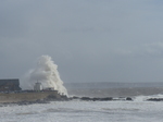 LZ01227 Big wave at Porthcawl lighthouse.jpg
